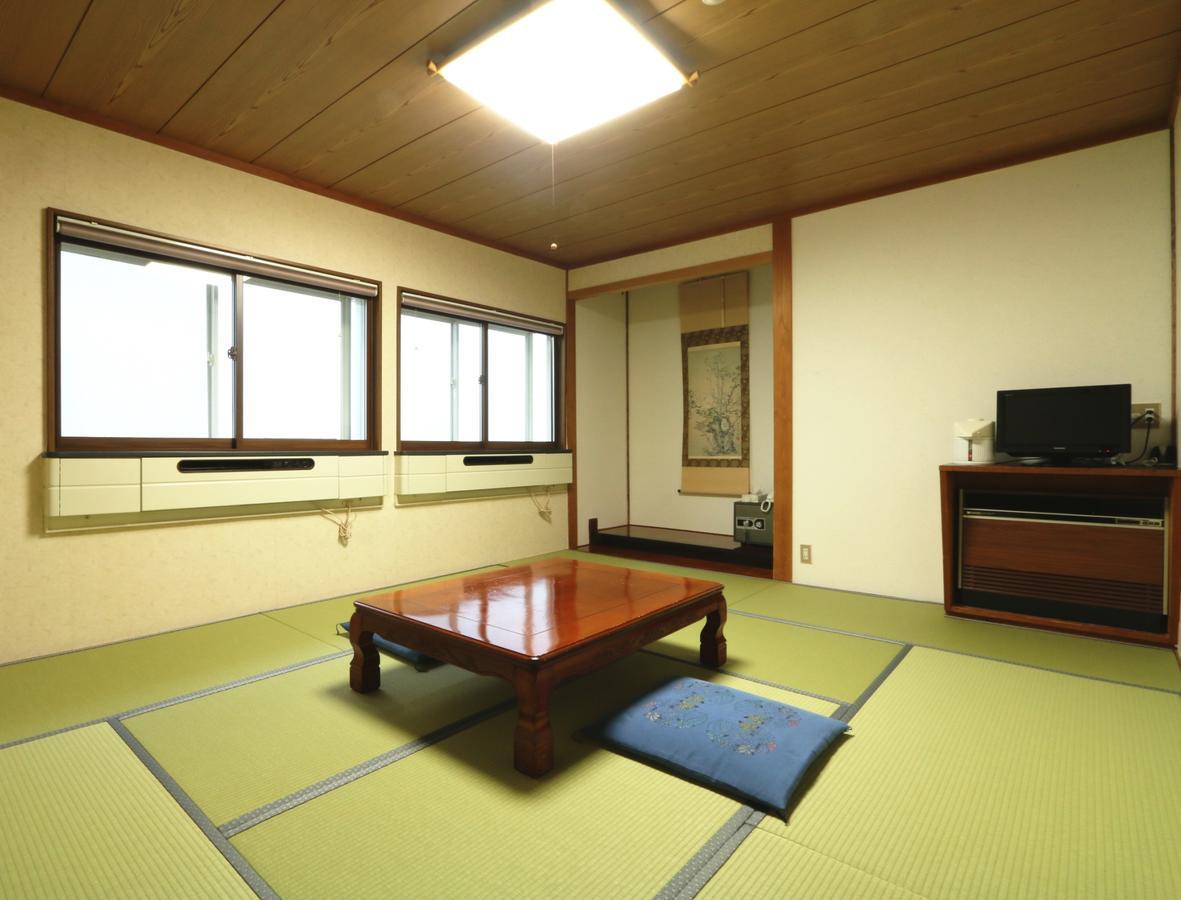 Hakuba Tsugaike Sunrise Tanne Hotel Otari Bagian luar foto