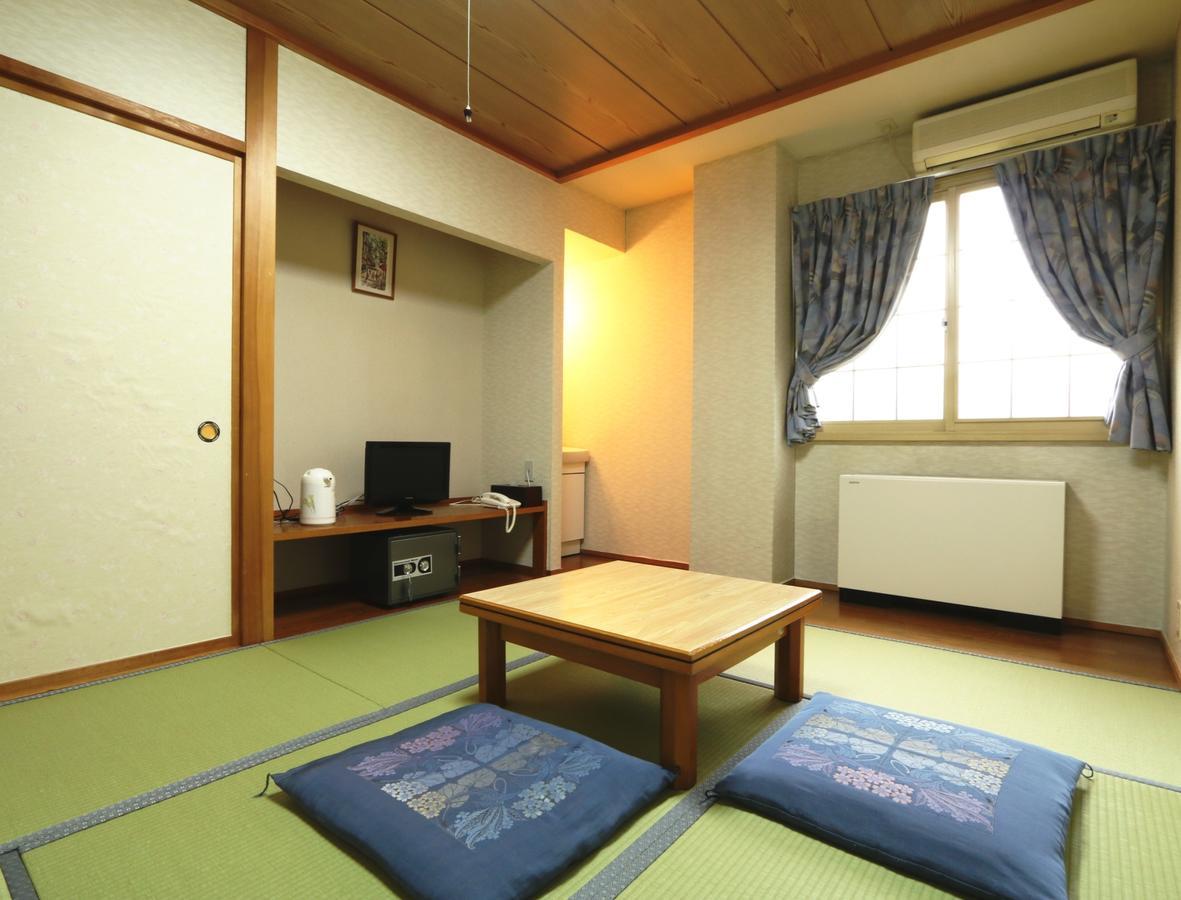 Hakuba Tsugaike Sunrise Tanne Hotel Otari Bagian luar foto