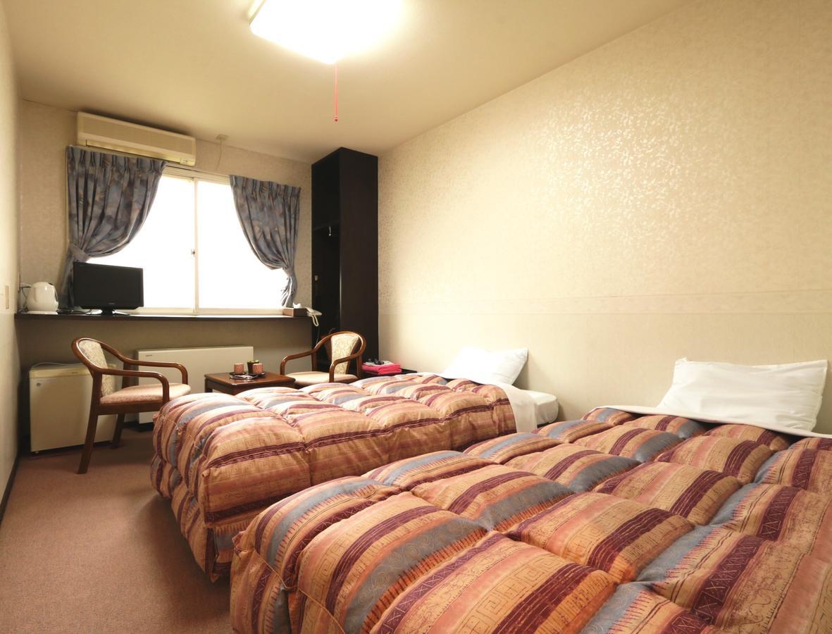 Hakuba Tsugaike Sunrise Tanne Hotel Otari Bagian luar foto